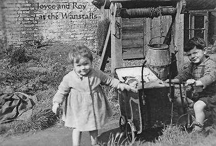 Wanstalls - roy and joyce woodward as children in back garden