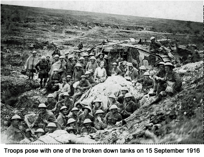 Troops pose with one of the broken down tanks on 15th September 1916